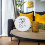 Abstract Puppy Bust Hand Embroidery Placed on the Table