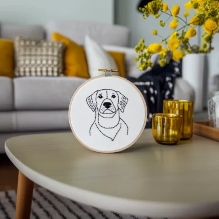 Abstract Puppy Hand Embroidery Artwork Placed on the Table