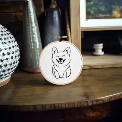 DIY Digital Cute Dog Embroidery Pattern placed on the table