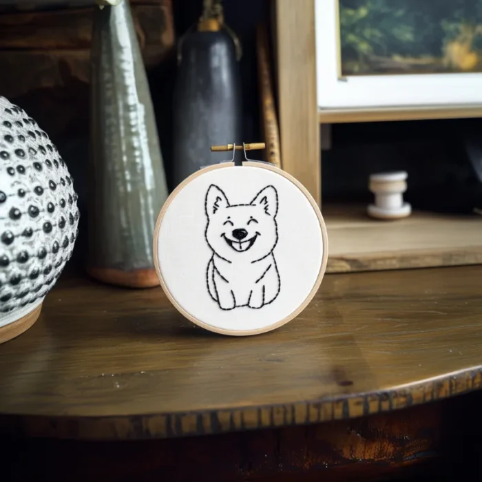 DIY Digital Cute Dog Embroidery Pattern placed on the table