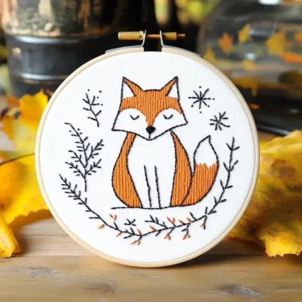 Close-up of a cute sleeping fox embroidery artwork