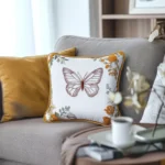 bright space with coffee table and khaki sofa decorated with two cushions