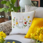 Gray sofa with knitted, flannel, and hand-embroidered rabbit cushions