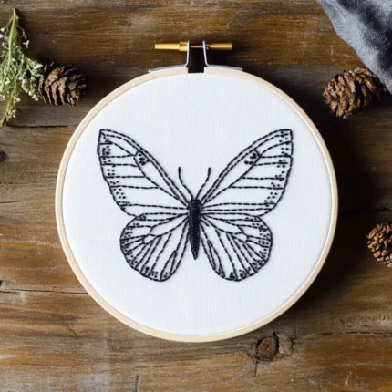 minimalist black line embroidery artwork, finished design