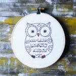 adorable round owl hand embroidery artwork on display