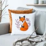 bright room with sunlight on a sofa and two cozy cushions