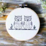 charming owl hand embroidery artwork on display, creating a relaxing atmosphere