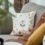 cozy sofa with a floral embroidered cushion, creating a warm atmosphere