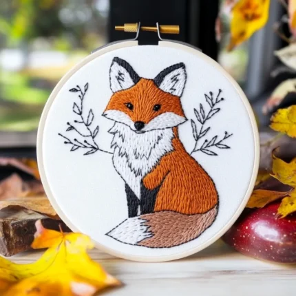 cute fox hand embroidery placed on the floor, with bright eyes looking forward