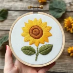 freshly finished hand-embroidered sunflower design
