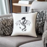 gray sofa with a white pillow embroidered in black thread featuring a flying dragon