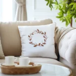 beige sofa with cozy pillows in bright, warm lighting, creating a comfortable atmosphere