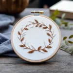 brown and white leaf wreath hand embroidery design