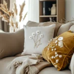 cozy sofa setting with two cushions and a blanket