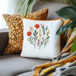 sofa with two brightly colored decorative cushions