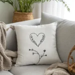 single cushion on a grey sofa, creating a warm and cozy living space