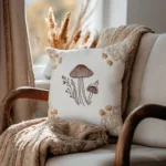 sunlit living room with cozy armchair, embroidered pillow and soft blanket